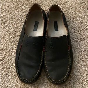 Black Olukai women’s shoes